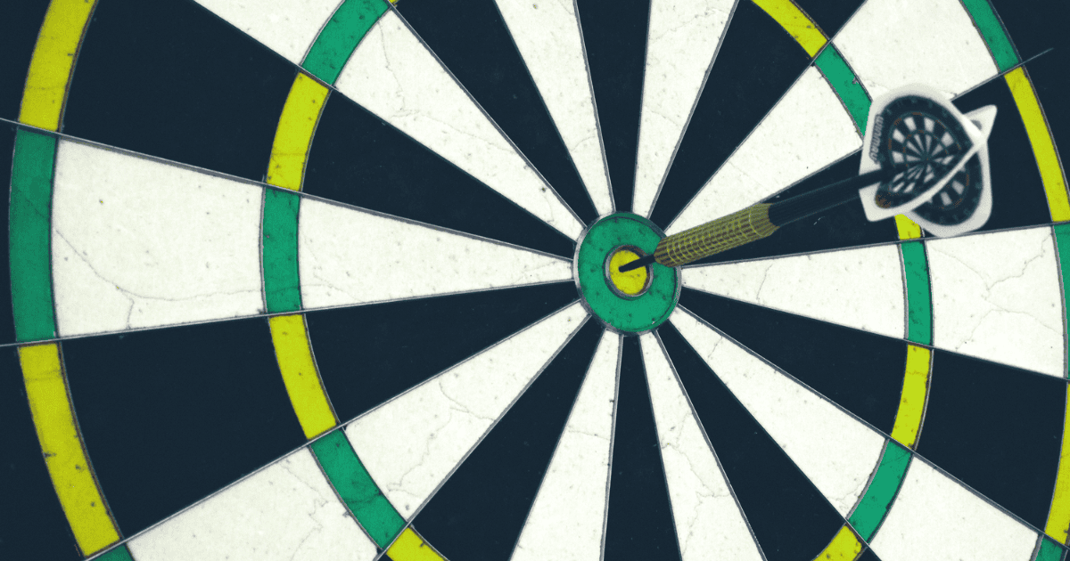 A dart hitting the center of a dartboard